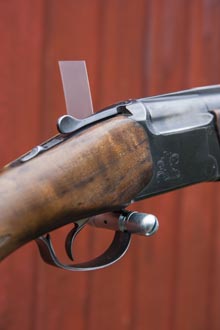XD Solution on trigger guard with a finger through the guard